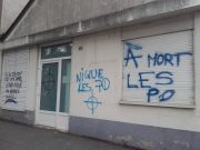 Tags homophobes sur la façade de Quazar